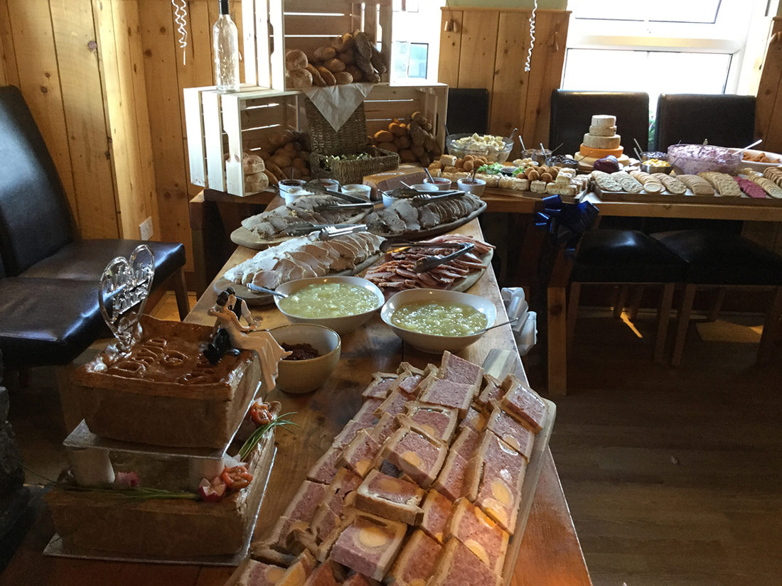 Cold meats and pork pies at a wedding buffet